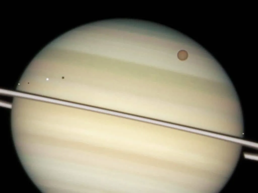 nasa announces new dragonfly drone mission to explore titan,nasa titan,nasa titan dragonfly,nasa titan images,nasa titan mission dragonfly,nasa's dragonfly will fly around titan looking for origins signs of life,seti,titano,titano e saturno,titano il principale satellite naturale di saturno ha una massa,titano nasa,titano pianeta,titano satellite,titano satellite vita,titano satelliti saturno,titano saturno atmosfera